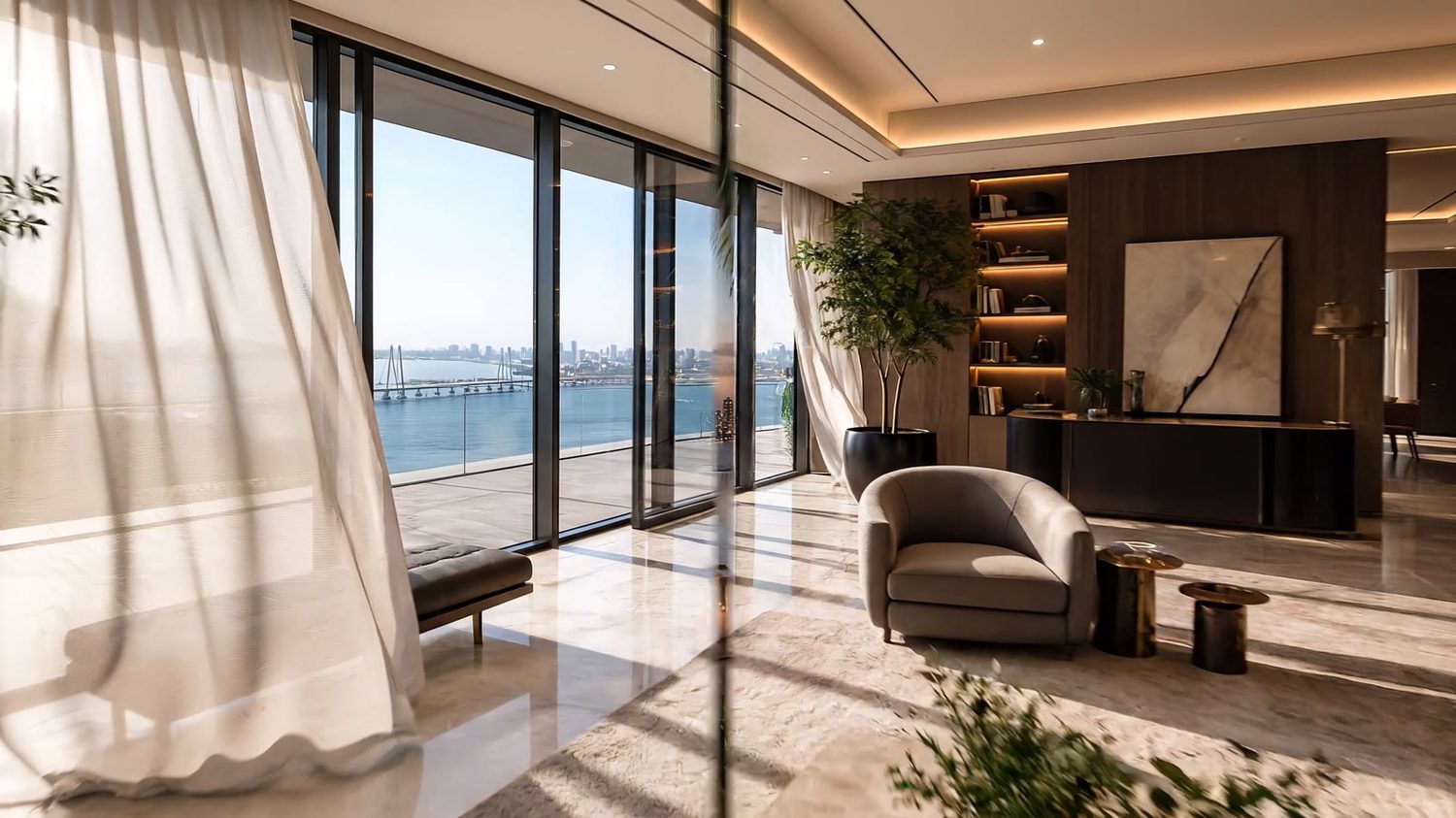 Living room with the bay and Sea Link beyond in a 5 BHK Sea Mansion at Adani Bandra Reclamation