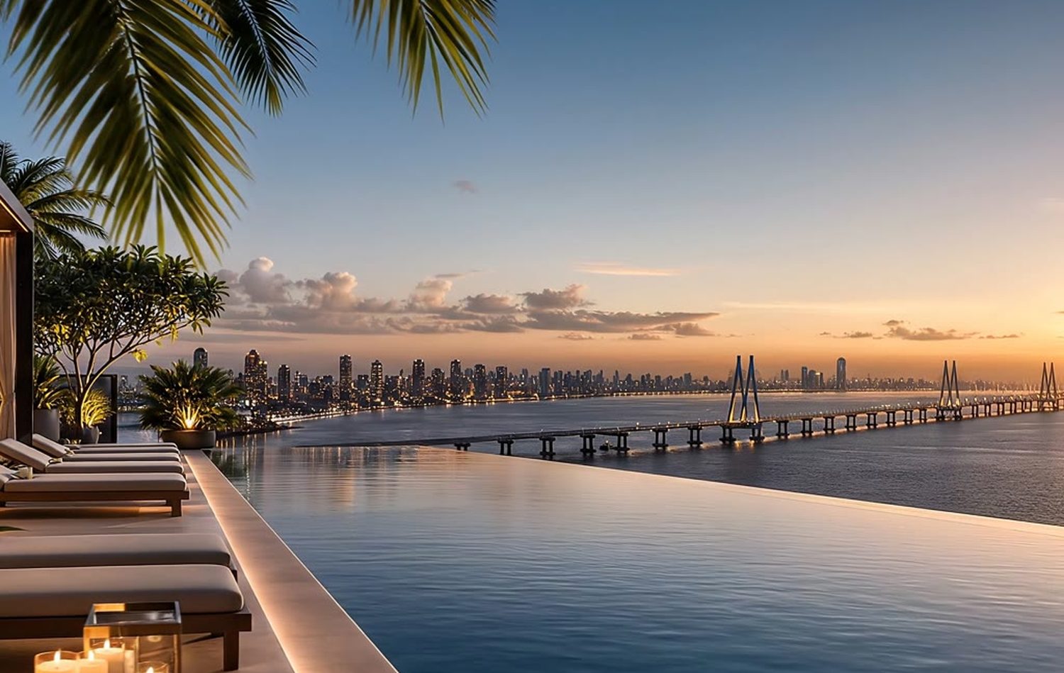 Adani Bandra Reclamation — Infinity pool deck looking out to the Sea Link at dusk
